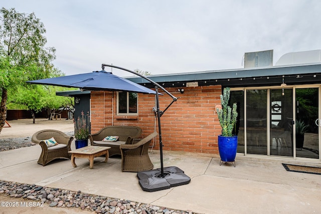 1652 W Roller Coaster Rd, Tucson, AZ 85704 - back of house with an outdoor hangout area and a patio