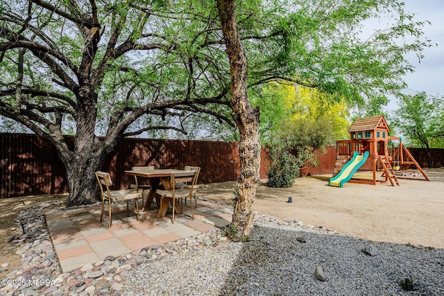 1652 W Roller Coaster Rd, Tucson, AZ 85704 - exterior space featuring a patio area, a fenced backyard, and outdoor dining area