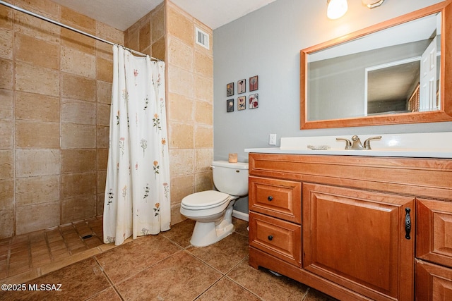 1652 W Roller Coaster Rd, Tucson, AZ 85704 - full bathroom with toilet, tile walls, a tile shower, visible vents, and vanity
