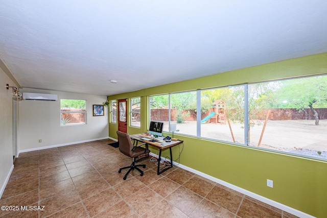 1652 W Roller Coaster Rd, Tucson, AZ 85704 - office area featuring an AC wall unit, baseboards, and tile patterned flooring