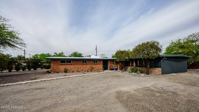 1652 W Roller Coaster Rd, Tucson, AZ 85704 - view of front of home featuring driveway