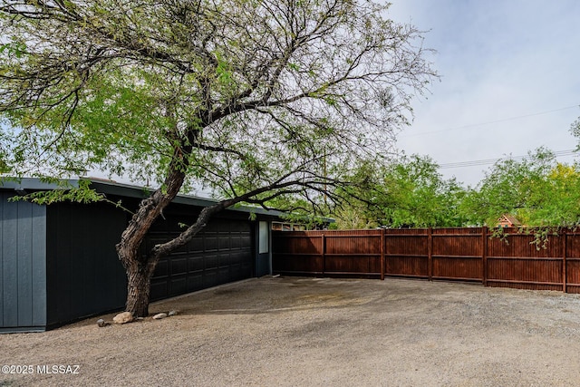 1652 W Roller Coaster Rd, Tucson, AZ 85704 - exterior space featuring a garage and fence