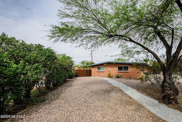 1652 W Roller Coaster Rd, Tucson, AZ 85704 - exterior space with fence and driveway