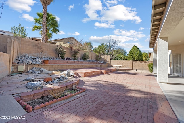 view of patio featuring a fenced backyard