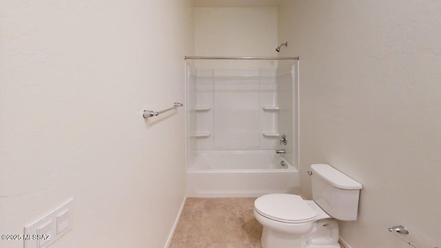 full bathroom featuring tile patterned floors, toilet, baseboards, and shower / bathtub combination