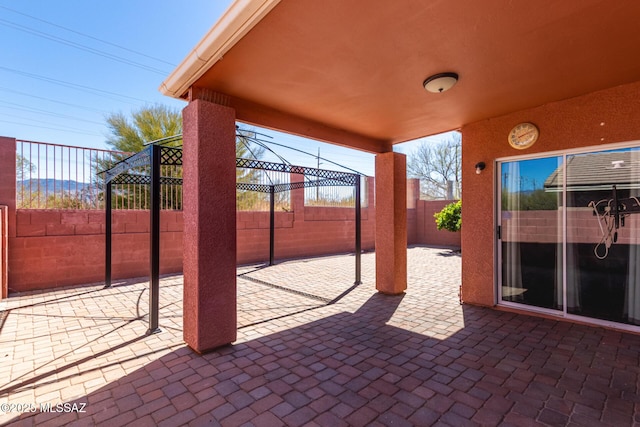 view of patio with a fenced backyard