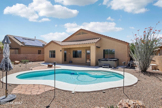 view of pool with a fenced in pool, a patio, a fenced backyard, and a hot tub