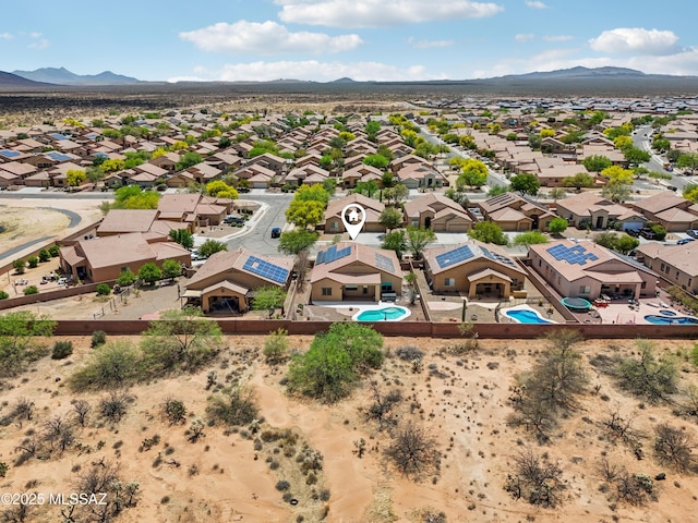aerial view featuring a mountain view and a residential view