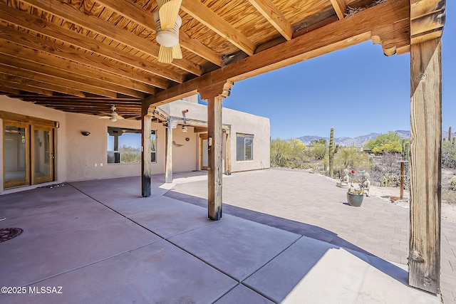 4247 W Flying Diamond Dr, Tucson, AZ 85742 - view of patio / terrace featuring a mountain view and a ceiling fan
