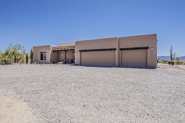 4247 W Flying Diamond Dr, Tucson, AZ 85742 - adobe home with stucco siding and an attached garage