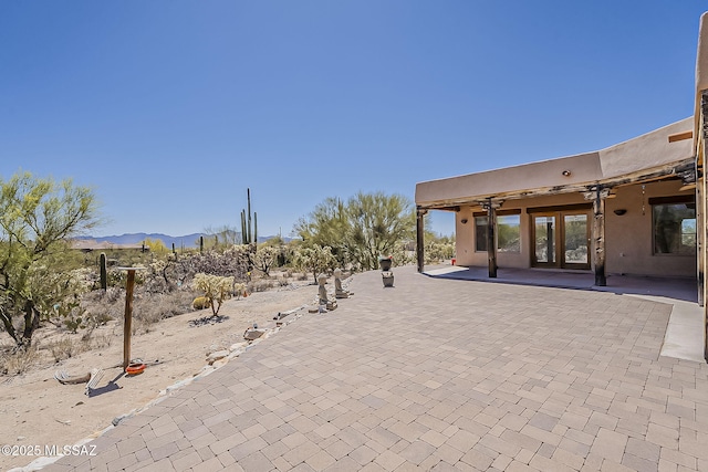 4247 W Flying Diamond Dr, Tucson, AZ 85742 - view of patio with a mountain view