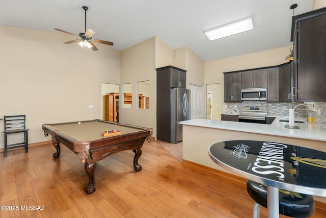 9622 E Paseo, San Ardo, Tucson, AZ 85747 - recreation room featuring a sink, high vaulted ceiling, ceiling fan, billiards table, and light wood-style floors