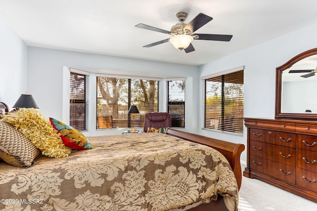 14045 N Desert Butte Dr, Oro Valley, AZ 85755 - bedroom with a ceiling fan and light colored carpet