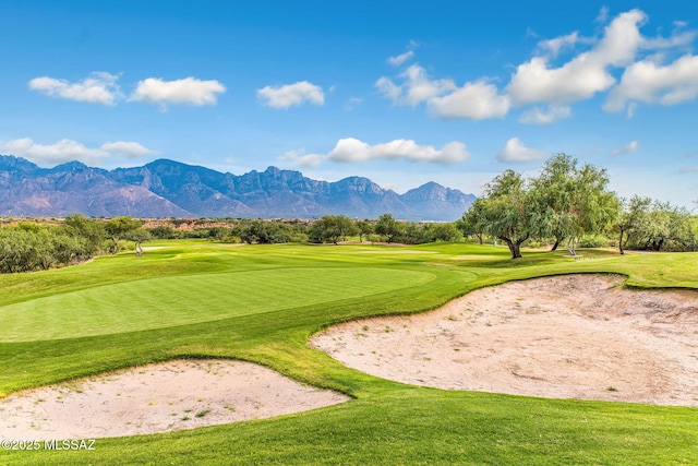 14045 N Desert Butte Dr, Oro Valley, AZ 85755 - view of community with a yard, a mountain view, and golf course view