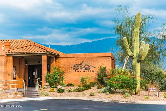 14045 N Desert Butte Dr, Oro Valley, AZ 85755 - community sign with a mountain view