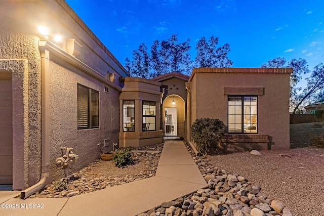 14045 N Desert Butte Dr, Oro Valley, AZ 85755 - exterior space featuring stucco siding