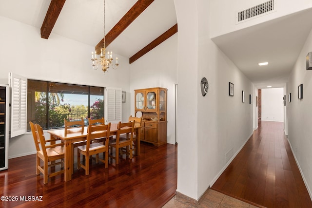 dining room with beamed ceiling, visible vents, high vaulted ceiling, and a chandelier