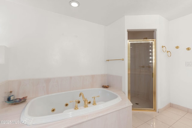 full bathroom with a shower stall, tile patterned floors, and a jetted tub