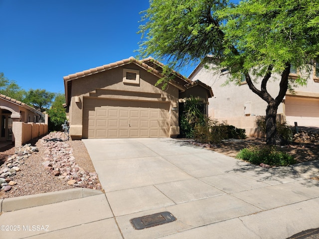 60464 E Blackcrest Loop, Tucson, AZ 85739 - view of front of home with a garage, fence, stucco siding, concrete driveway, and a tile roof