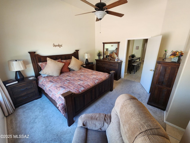 60464 E Blackcrest Loop, Tucson, AZ 85739 - bedroom with a high ceiling, light colored carpet, and ceiling fan