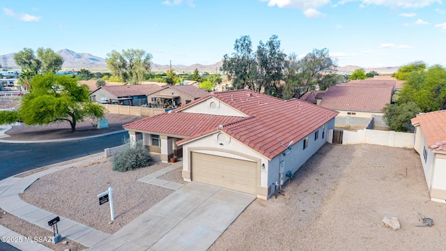 drone / aerial view with a mountain view and a residential view
