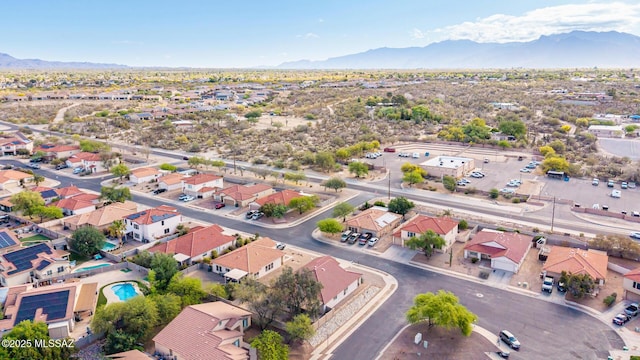 drone / aerial view with a residential view and a mountain view