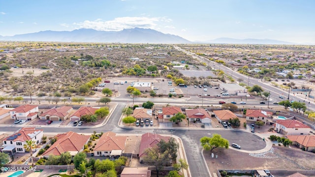 aerial view featuring a mountain view and a residential view