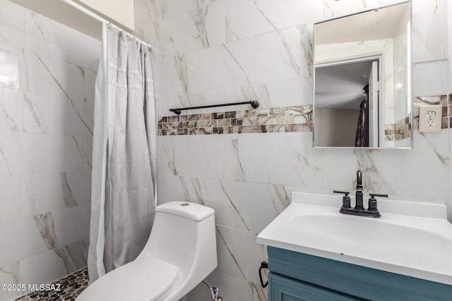 bathroom featuring tile walls, toilet, vanity, and tiled shower