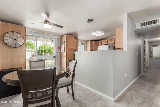 dining area featuring visible vents, baseboards, and ceiling fan