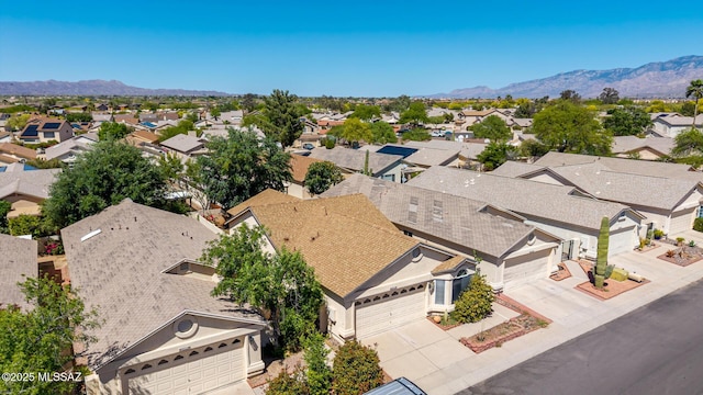 bird's eye view featuring a residential view and a mountain view