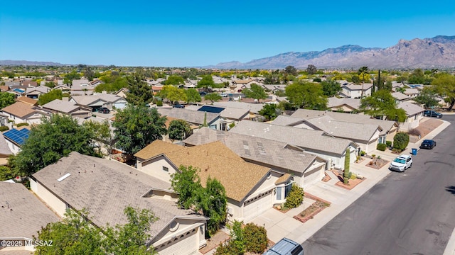 drone / aerial view with a mountain view and a residential view