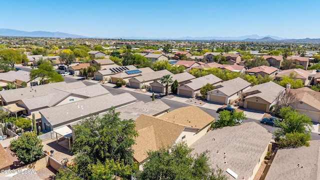 bird's eye view featuring a mountain view and a residential view