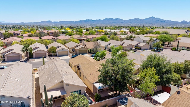 birds eye view of property with a residential view and a mountain view