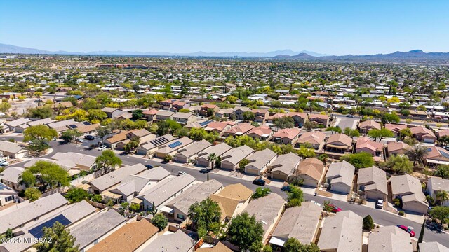 birds eye view of property featuring a mountain view and a residential view