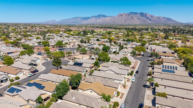 drone / aerial view featuring a residential view and a mountain view