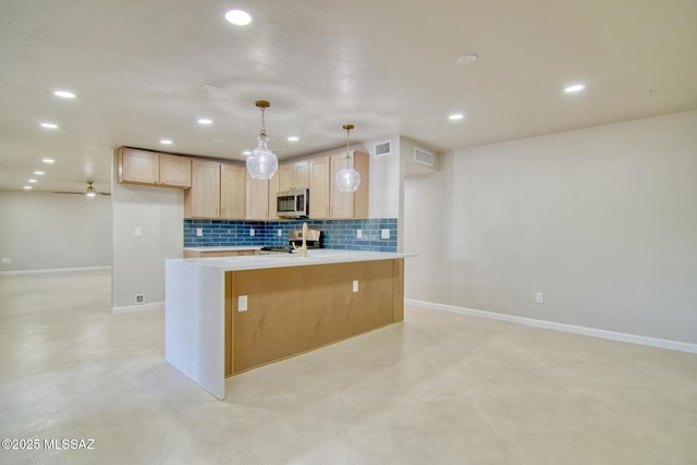 5754 S Ray Stra, Tucson, AZ 85706 - kitchen with recessed lighting, appliances with stainless steel finishes, light countertops, backsplash, and visible vents