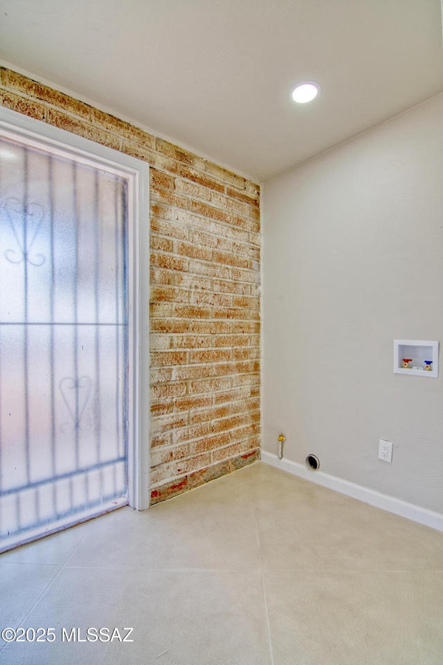 5754 S Ray Stra, Tucson, AZ 85706 - spare room with brick wall, recessed lighting, and baseboards