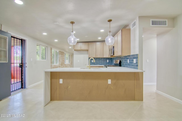 5754 S Ray Stra, Tucson, AZ 85706 - kitchen with a sink, baseboards, appliances with stainless steel finishes, and visible vents