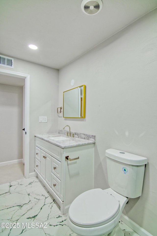 5754 S Ray Stra, Tucson, AZ 85706 - bathroom featuring marble finish floor, visible vents, toilet, and vanity