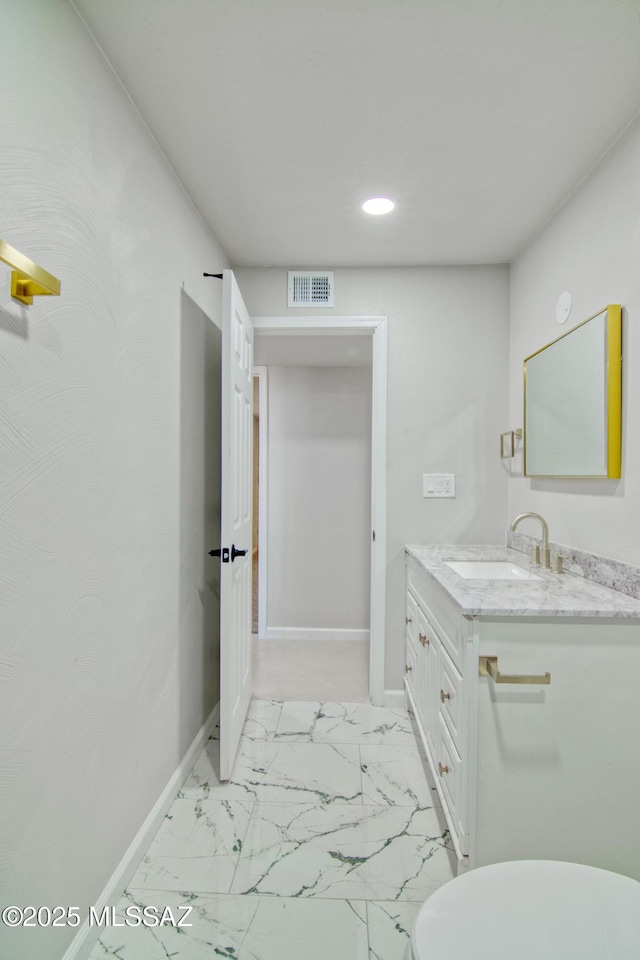 5754 S Ray Stra, Tucson, AZ 85706 - bathroom featuring recessed lighting, marble finish floor, vanity, baseboards, and visible vents