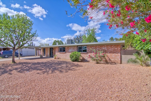 5754 S Ray Stra, Tucson, AZ 85706 - ranch-style house featuring brick siding and central air condition unit