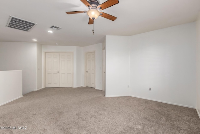 unfurnished bedroom with visible vents, recessed lighting, and carpet flooring