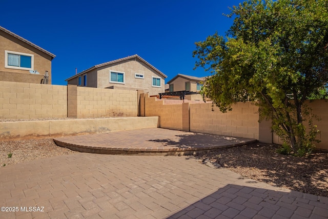view of patio with a fenced backyard
