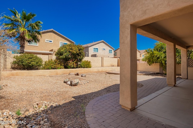 view of yard featuring a fenced backyard and a patio