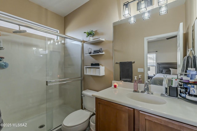 ensuite bathroom featuring toilet, ensuite bath, vanity, and a stall shower