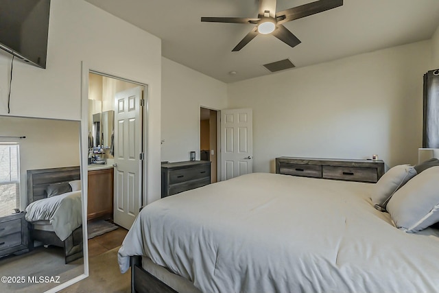 bedroom with visible vents and a ceiling fan