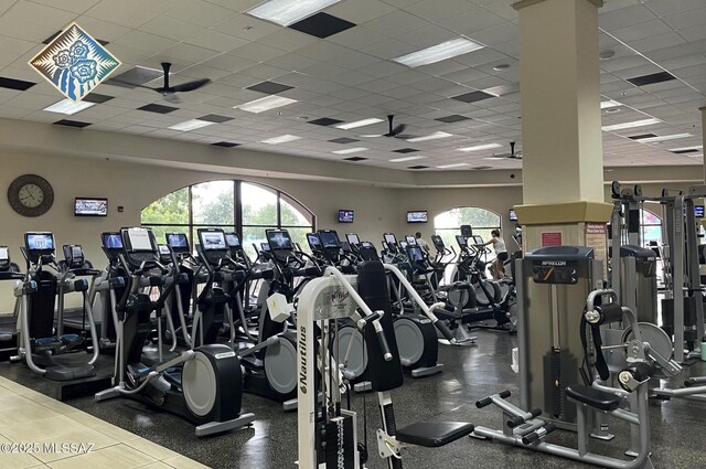 exercise room featuring a paneled ceiling