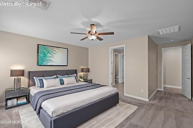 17789 S Silent Meadows Path, Sahuarita, AZ 85629 - carpeted bedroom featuring visible vents, baseboards, and ceiling fan