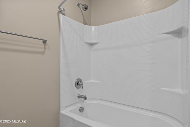 bathroom with shower / bathing tub combination