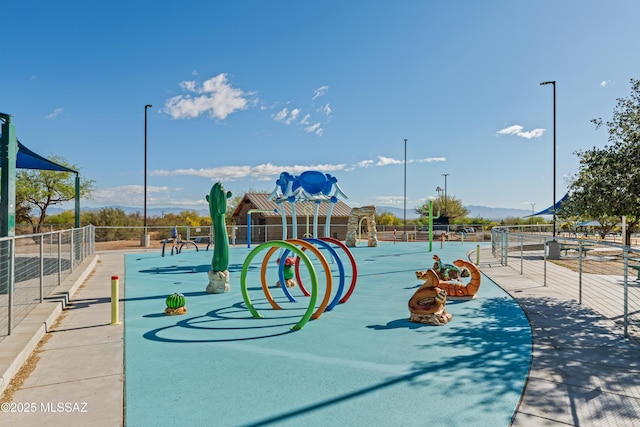 view of play area with fence
